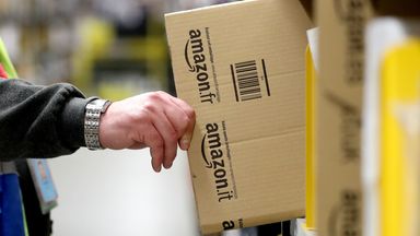 File photo dated 13/11/17 of an Amazon associate collecting packaging at the Dunfermline fulfillment centre, Fife.